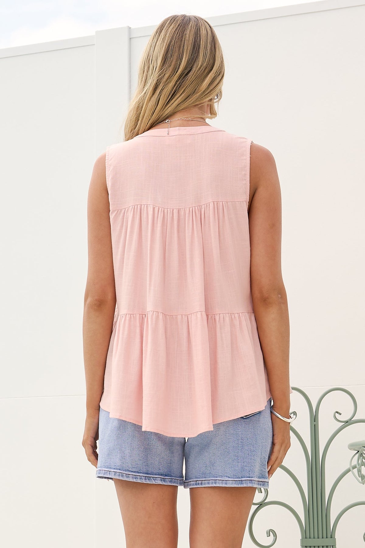Ariana Top - High Neckline Sleeveless Tiered Button Down in Blush